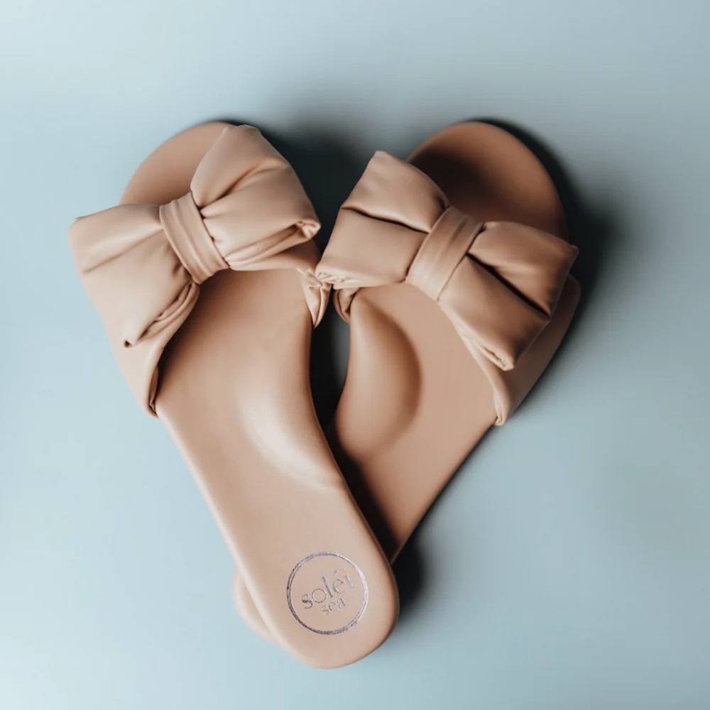 Solei Bow Slide Sandals in Nude